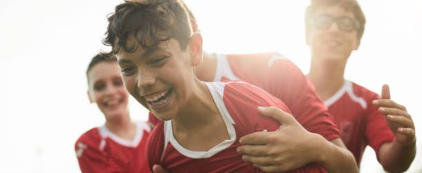 Lifestyle children training and playing soccer.